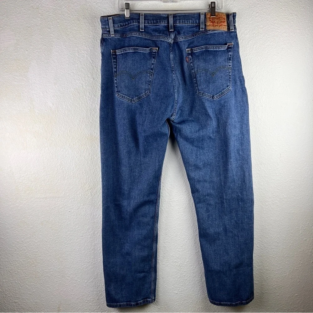 LEVI’S 550 JEANS. Great used condition. Size 38/32. Medium Wash. Frayed hems